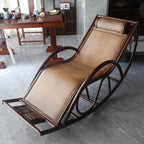Cozy reading nook with a brown wicker rocking armchair