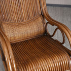 Stylish black rocking chair with natural wood legs