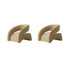 Comfortable fixed-back chair in neutral tones