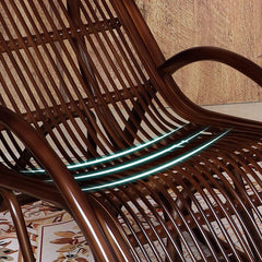 Close-up of red cane rocking chair fabric