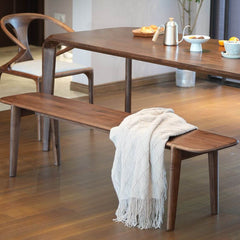 Close-up of walnut wood grain on dining bench