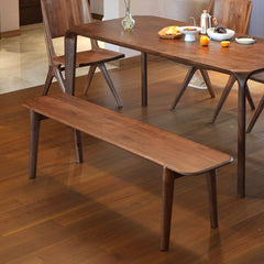 Spacious dining area with walnut wood bench