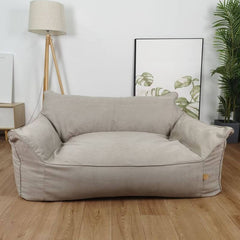 Grey bean bag sofa with arm rests