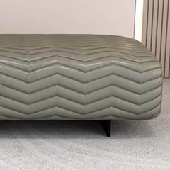 Green upholstered bedroom bench with arms