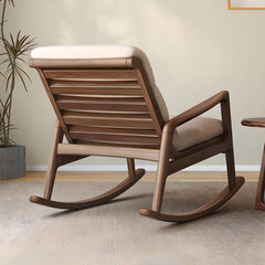 Walnut wood legs of the rocking chair