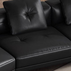 Sleek black sofa as a room centerpiece