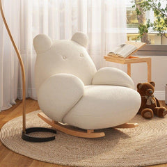 Cream upholstered rocking chair with ottoman