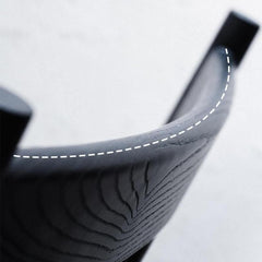 Close-up of the rocking chair's black finish