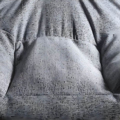 Overview of the gray bean bag chair fabric texture