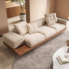 Cozy cream sofa with pillows