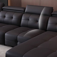 living room with dark recliner sofa