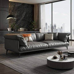 Grey and amber color sofa with pillows