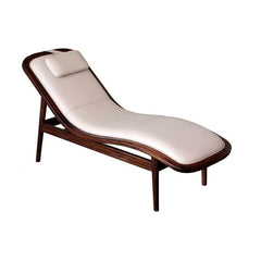 Chaise lounge showcasing wood frame and upholstery