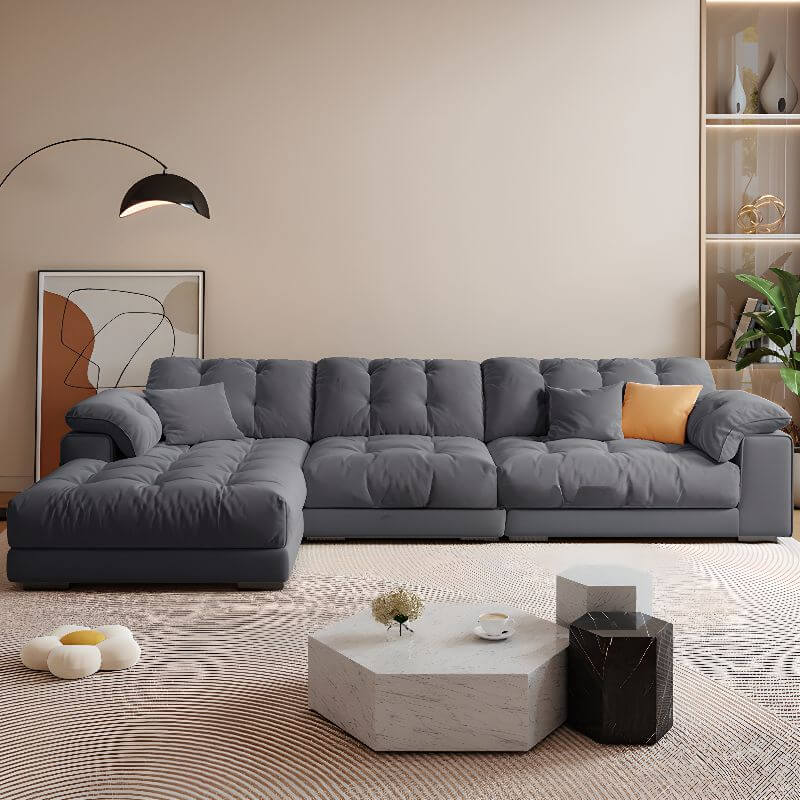 Sofa close-up featuring tufted back