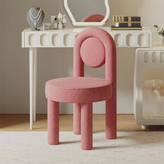 Elegant pink upholstered vanity stool with metal frame