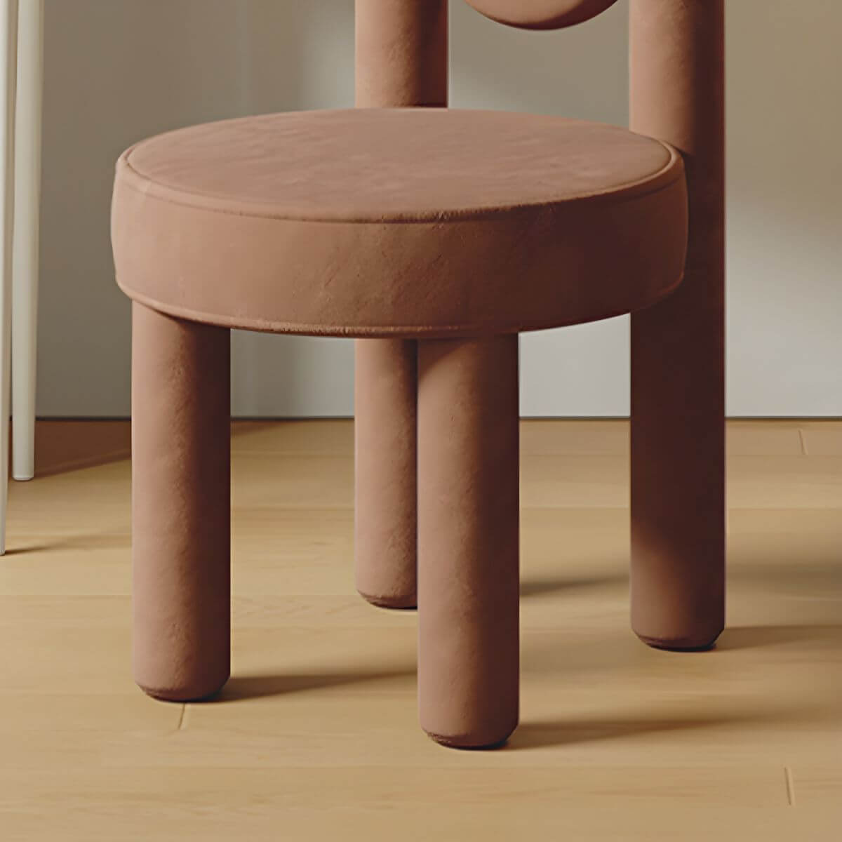 Cream upholstered vanity stool for a stylish accent