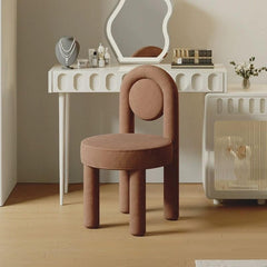 Cream upholstered vanity stool for a stylish accent