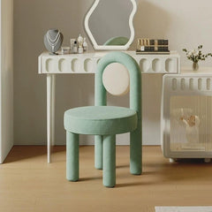 Cyan upholstered vanity stool with sleek metal frame