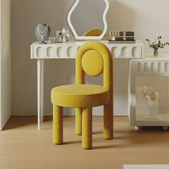 Coffee-colored upholstered vanity stool in a modern design