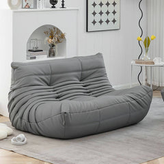 Stylish grey bean bag chair in modern interior