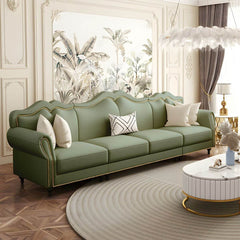 Leather sofa with nailhead trim in a contemporary setting