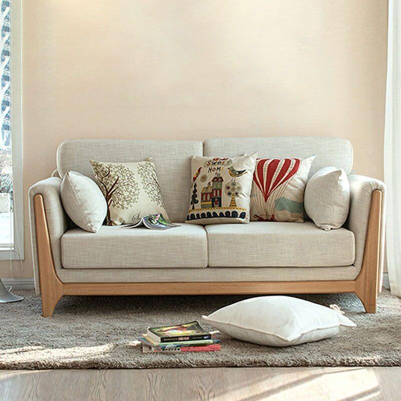 Modern minimalist fabric settee in a living room