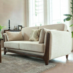 Modern minimalist fabric settee in a living room