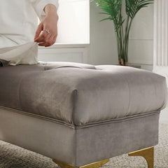 Stylish grey ottoman as a coffee table