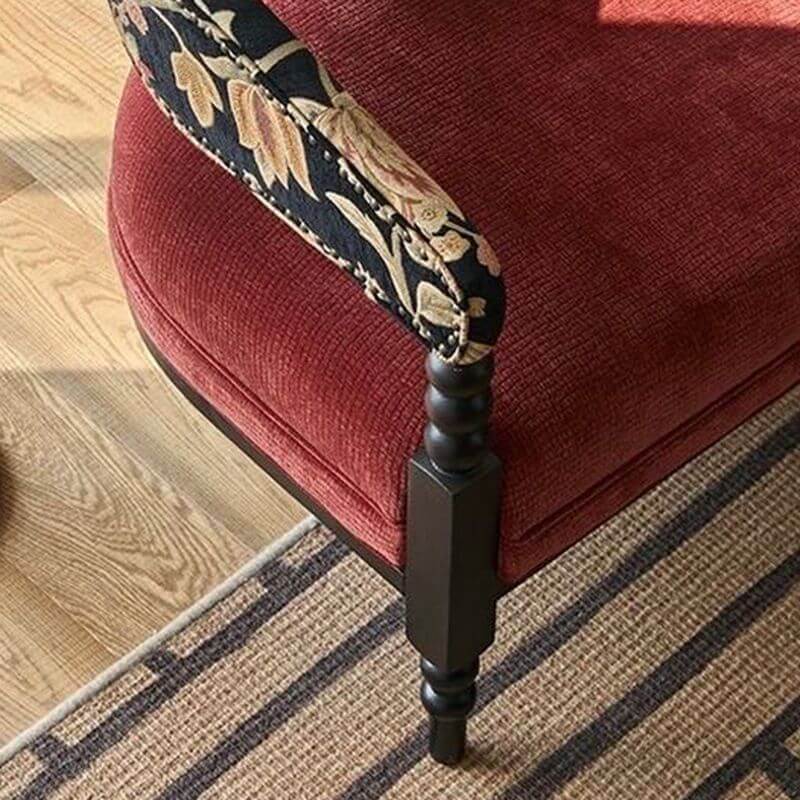 Armchair in natural light featuring floral motifs