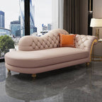 Large glam chaise lounge chair surrounded by decor