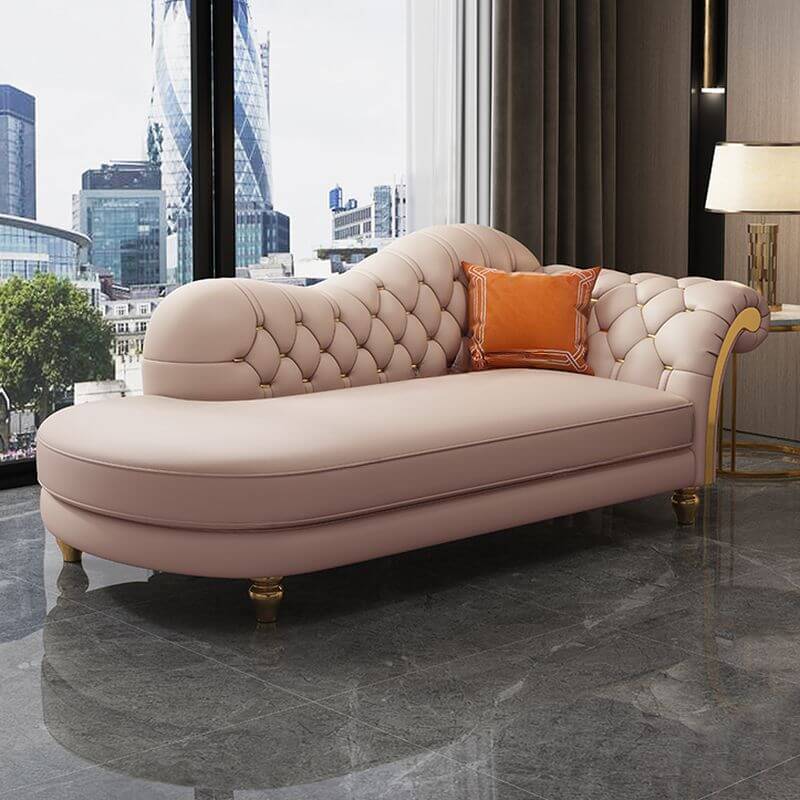 Large glam chaise lounge chair surrounded by decor