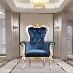 Royal blue accent chair in a modern living room