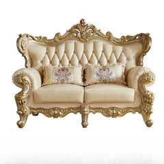 nailhead design on cream sofa