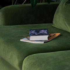 Minimalist green sofa in urban setting