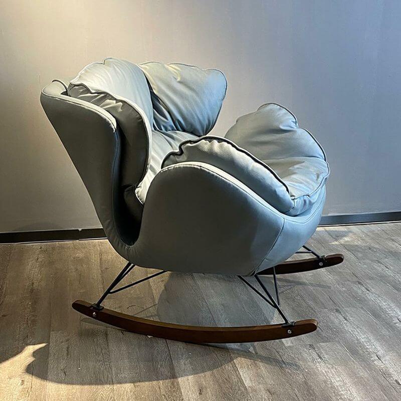 black upholstered rocking chair with recessed arms