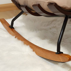 Brown wood legs of rocking chair