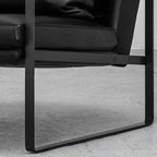 Decorative pillow on Industrial Pillow Back Armchair