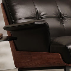 Leather armchair paired with contemporary furniture