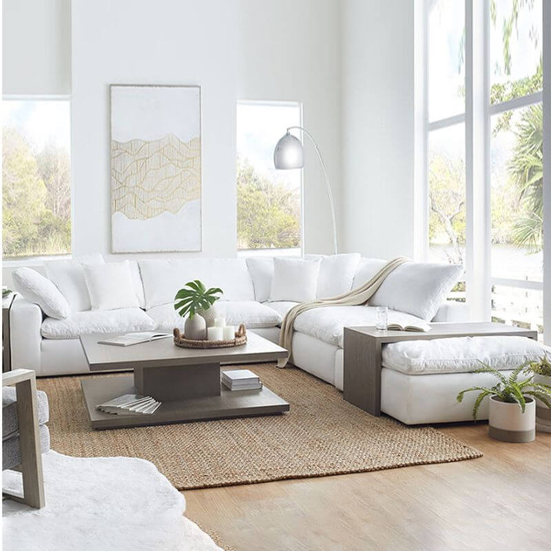 Chalk colored sofa in living room Main image