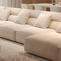 Stylish L-shape sofa with decorative pillows