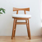 Upholstered accent stool in living room