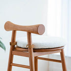 Beige upholstered modern stool