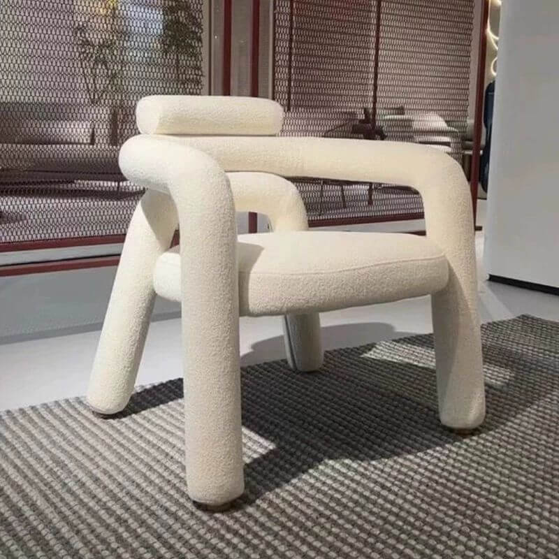 Lime green curved arm chair in modern living room