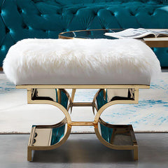 Elegant golden leg detail on modern ottoman