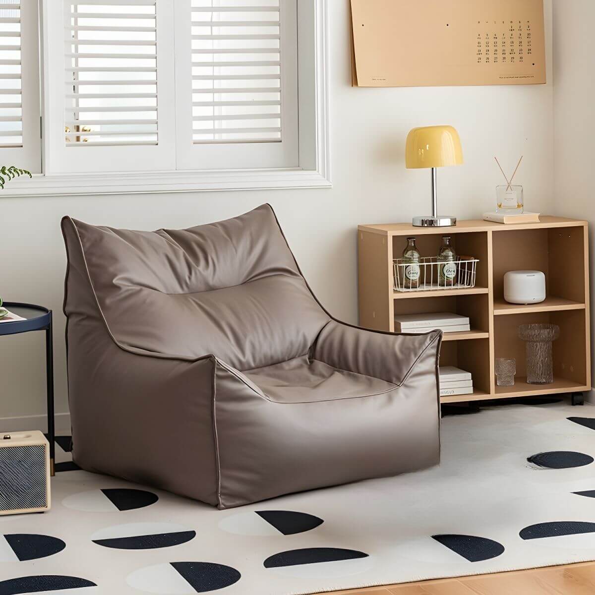 Black faux leather bean bag chair filled with polypropylene beans