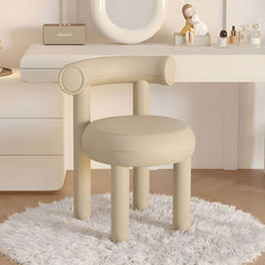 Lake blue upholstered vanity stool positioned beside modern vanity