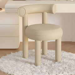 Brown upholstered vanity stool for a warm touch in design