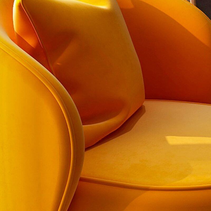 Contemporary armless chair beside bookshelf