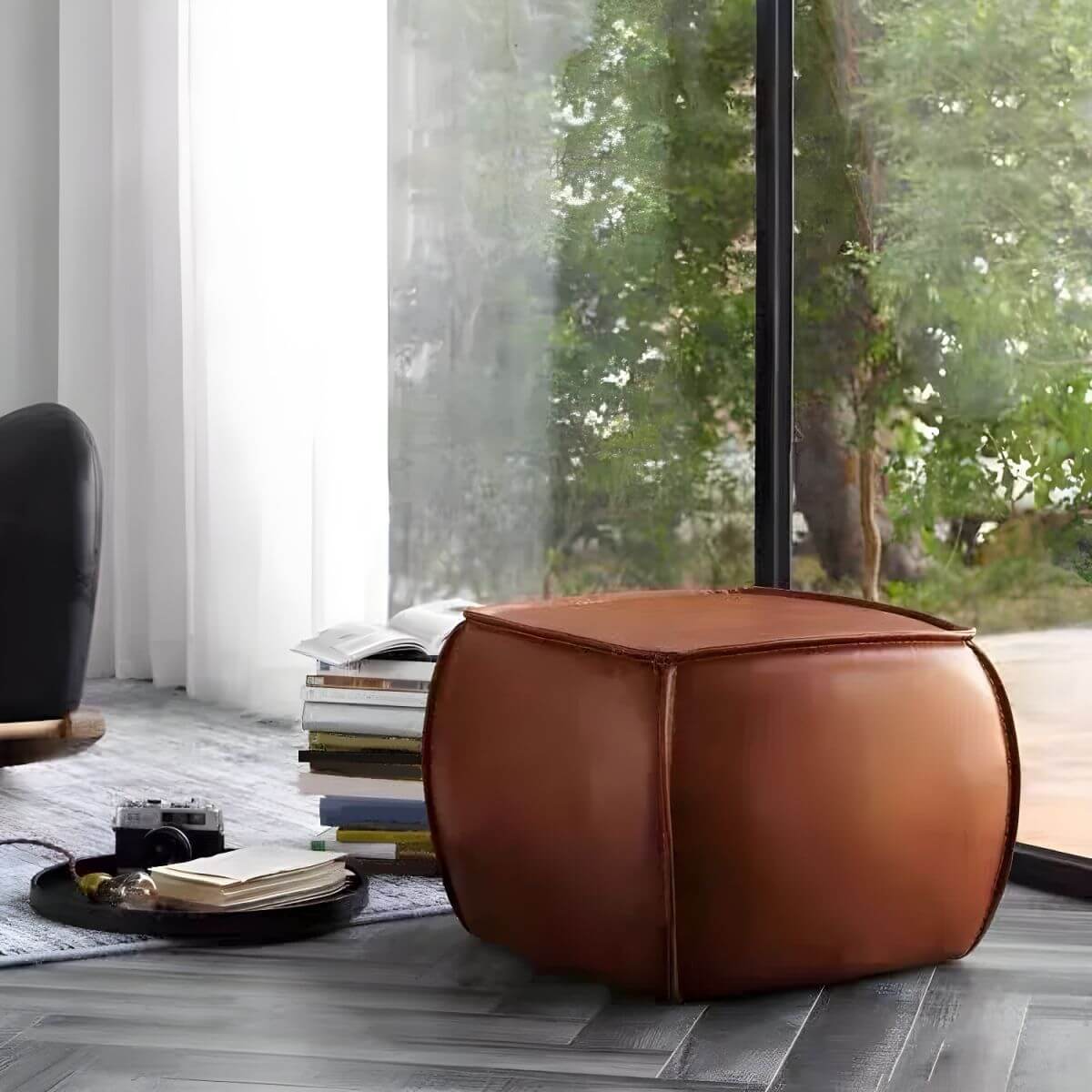 Brown Leather Upholstered Stool from Side View