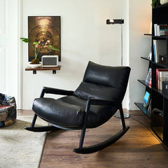 Angle view of the black upholstered rocking chair